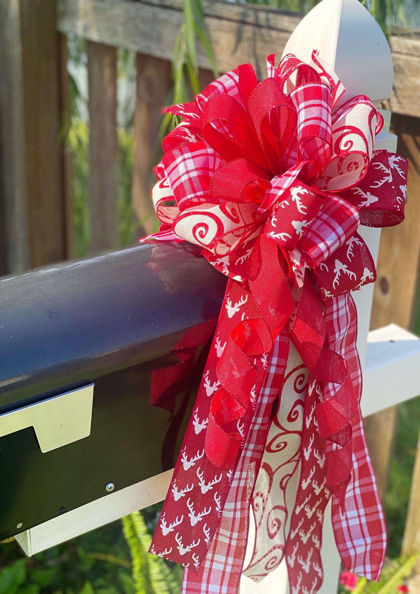 Christmas Bow in Red and White Featuring Reindeers. Perfect for Mailbox, Door, and Wreath.