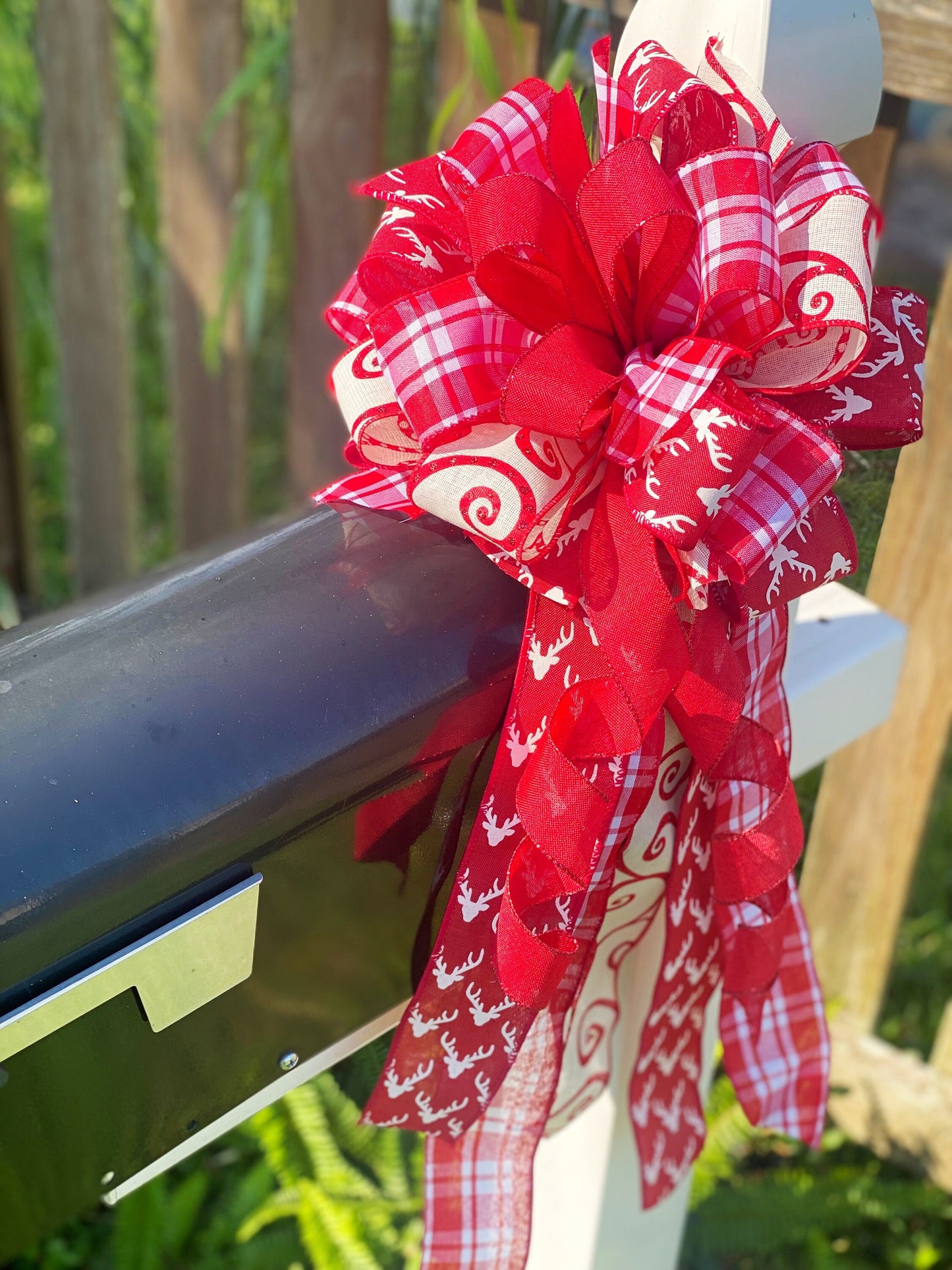 Christmas Bow in Red and White Featuring Reindeers. Perfect for Mailbox, Door, and Wreath.