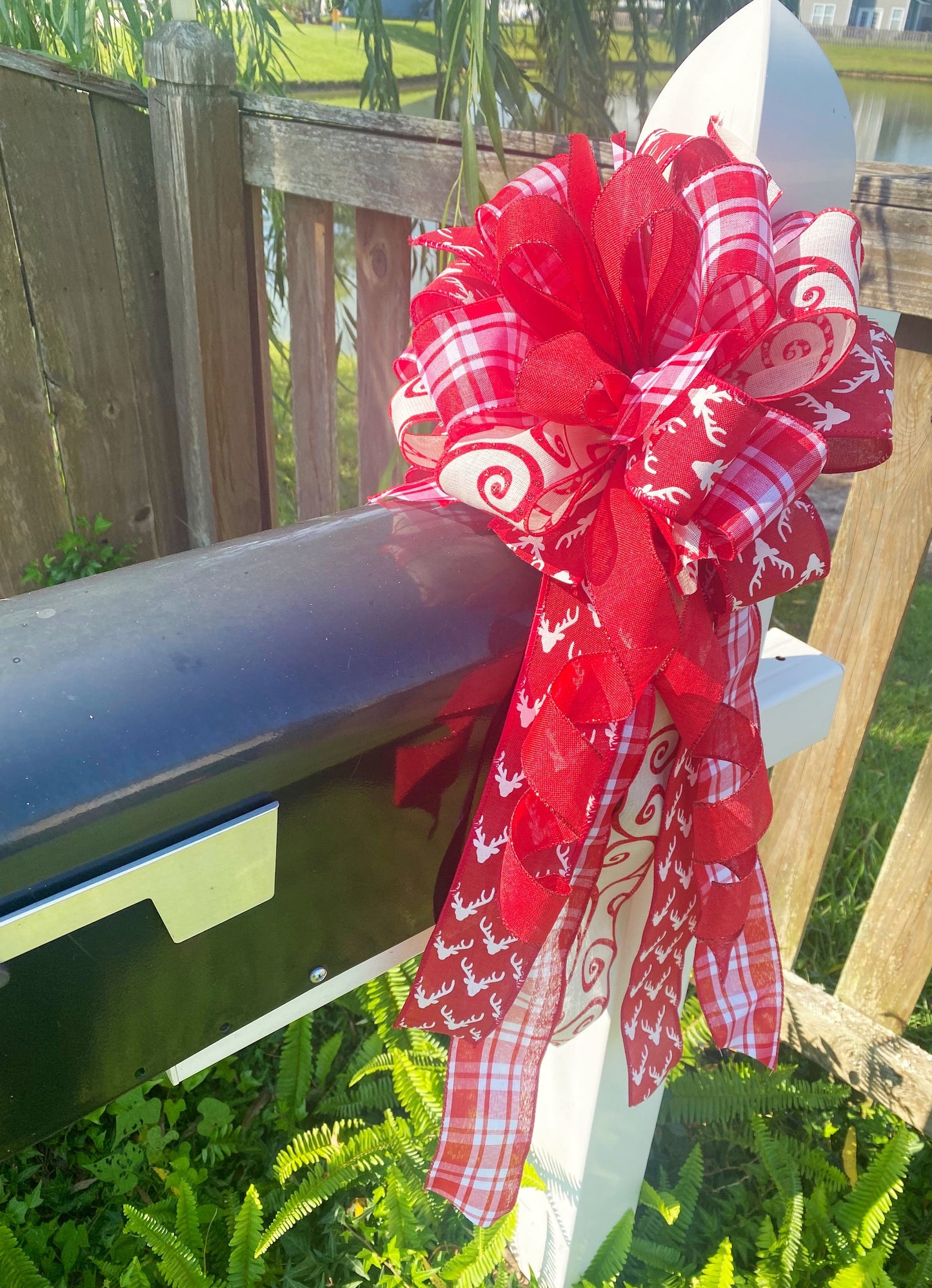 Christmas Bow in Red and White Featuring Reindeers. Perfect for Mailbox, Door, and Wreath.