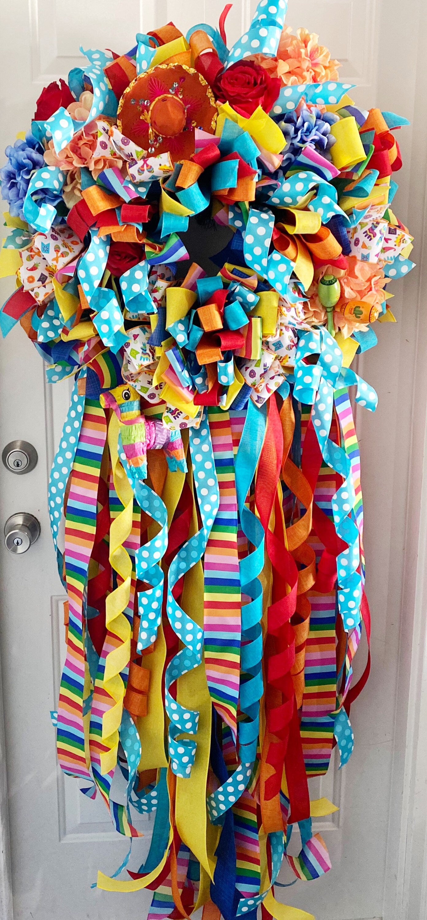 Cinco De Mayo Wreath in Blue Yellow, Orange, and Multicolors Featuring Maracas & Piñatas.