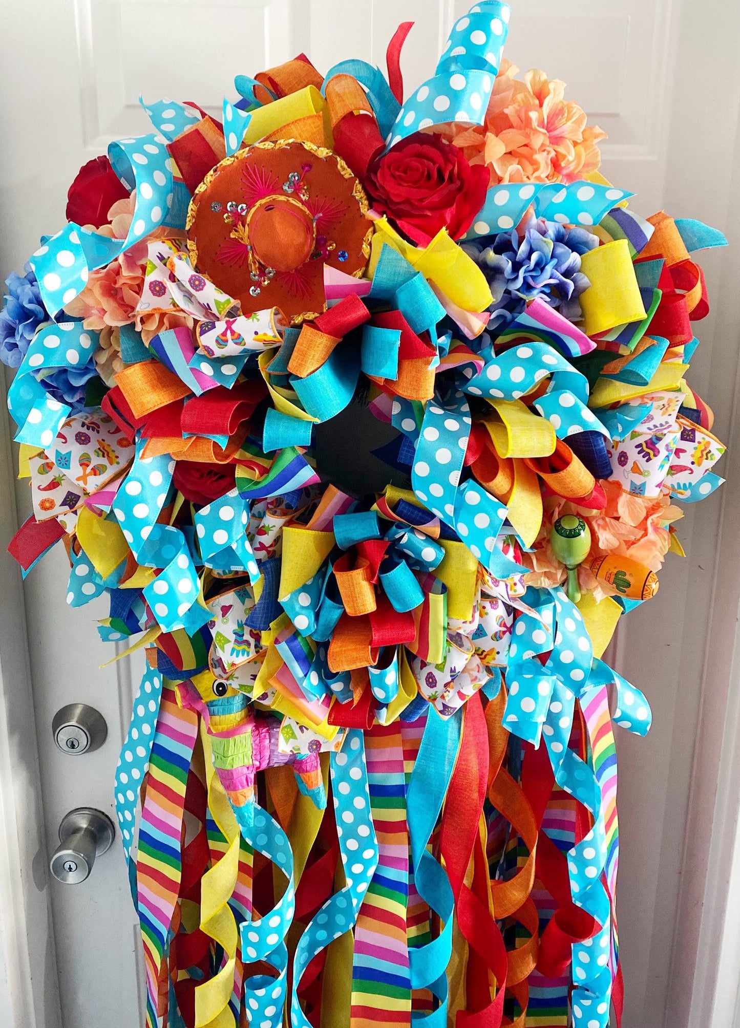 Cinco De Mayo Wreath in Blue Yellow, Orange, and Multicolors Featuring Maracas & Piñatas.