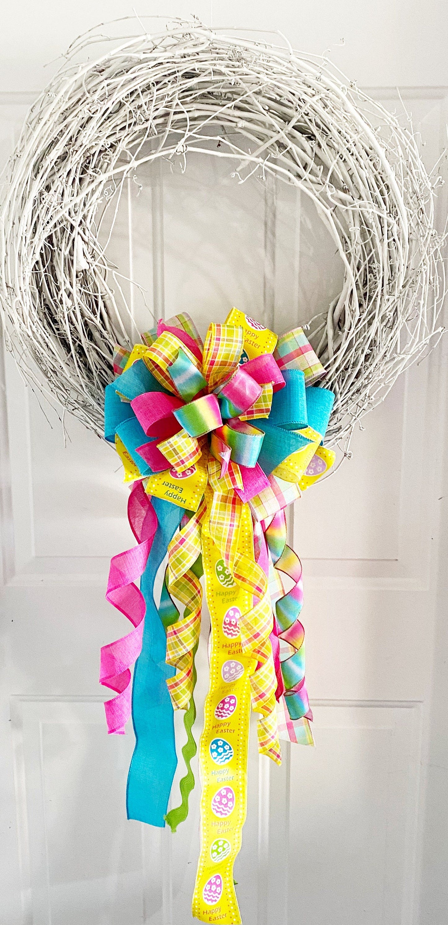 Easter Bow in Yellow, Lavender, and Pink with Multipattern Ribbon, Featuring Eggs. Perfect for Mailbox, Door, and Wreath.