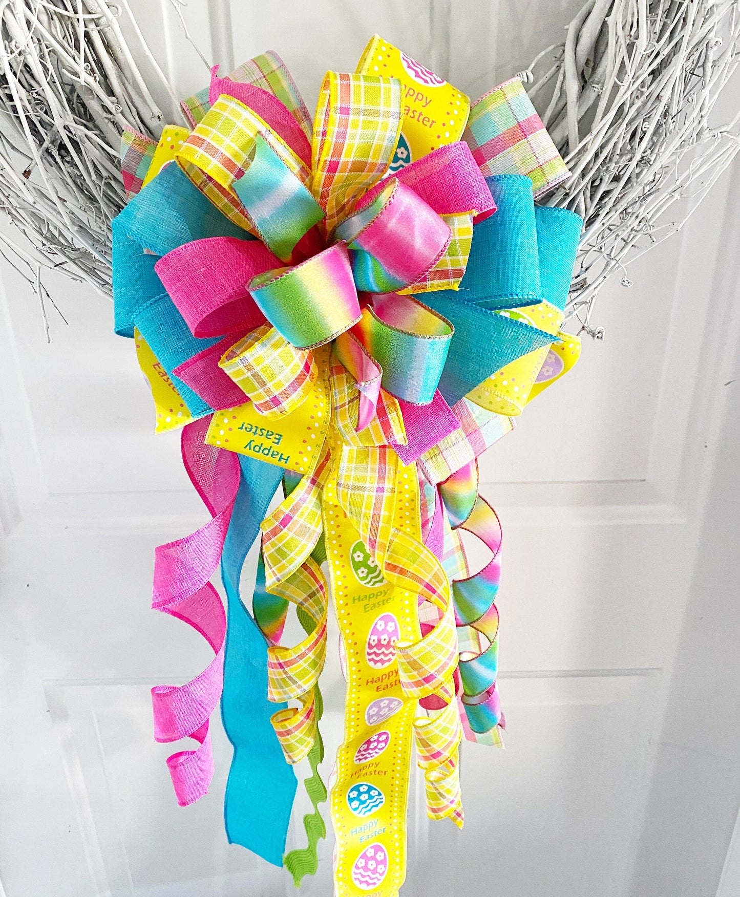 Easter Bow in Yellow, Lavender, and Pink with Multipattern Ribbon, Featuring Eggs. Perfect for Mailbox, Door, and Wreath.