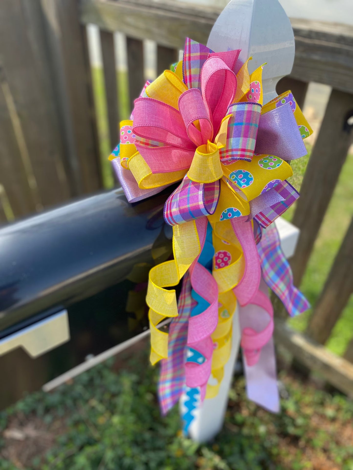 Easter Bow in Yellow, Lavender, and Pink with Multipattern Ribbon, Featuring Eggs. Perfect for Mailbox, Door, and Wreath.