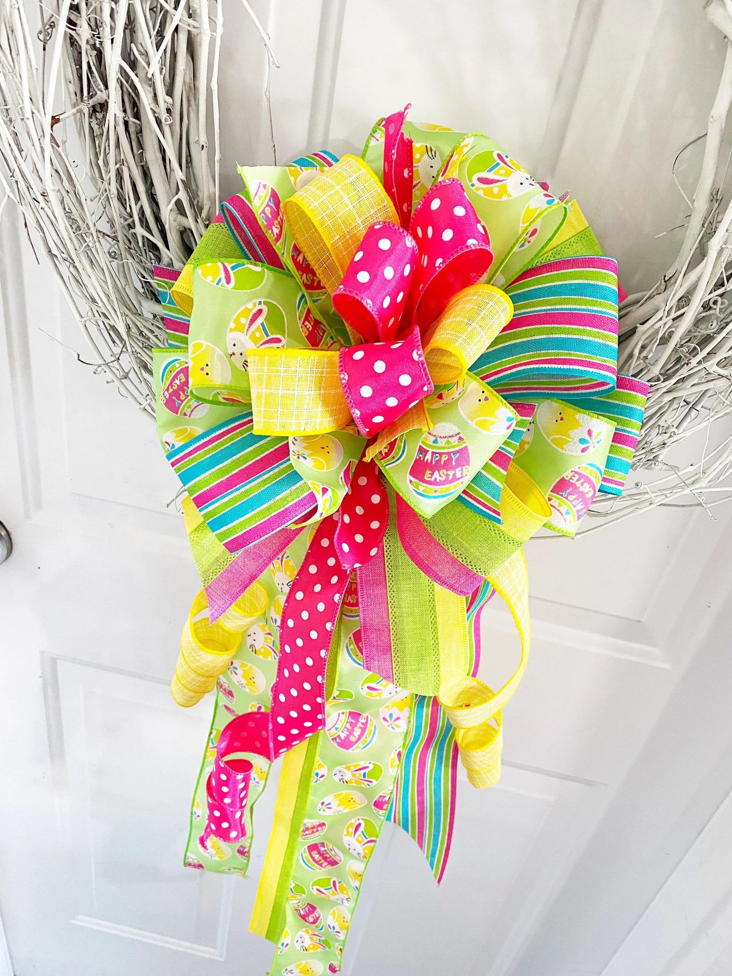 Easter Bow in Yellow, Pink, & Green with Multi Pattern Ribbon Featuring Easter Eggs and Bunnies. Perfect for Mailbox, Door, and Wreath.