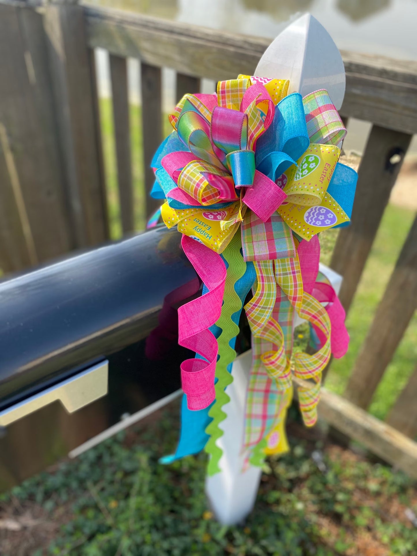 Easter Bow in Teal, Yellow, and Pink Multipattern Featuring Easter Eggs. Perfect for Mailbox, Door, and Wreath.