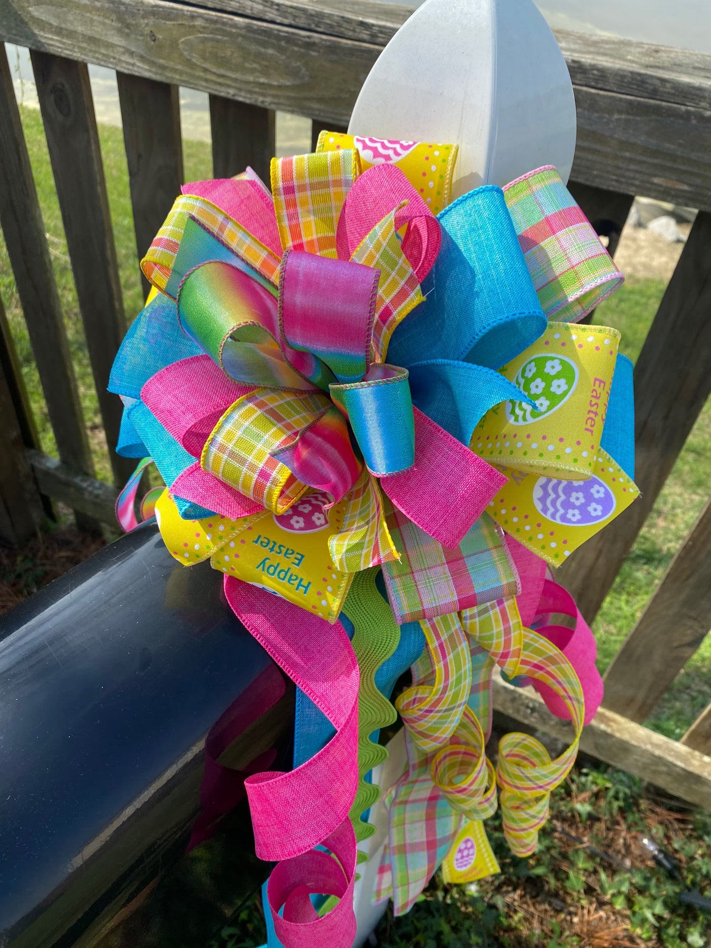 Easter Bow in Teal, Yellow, and Pink Multipattern Featuring Easter Eggs. Perfect for Mailbox, Door, and Wreath.