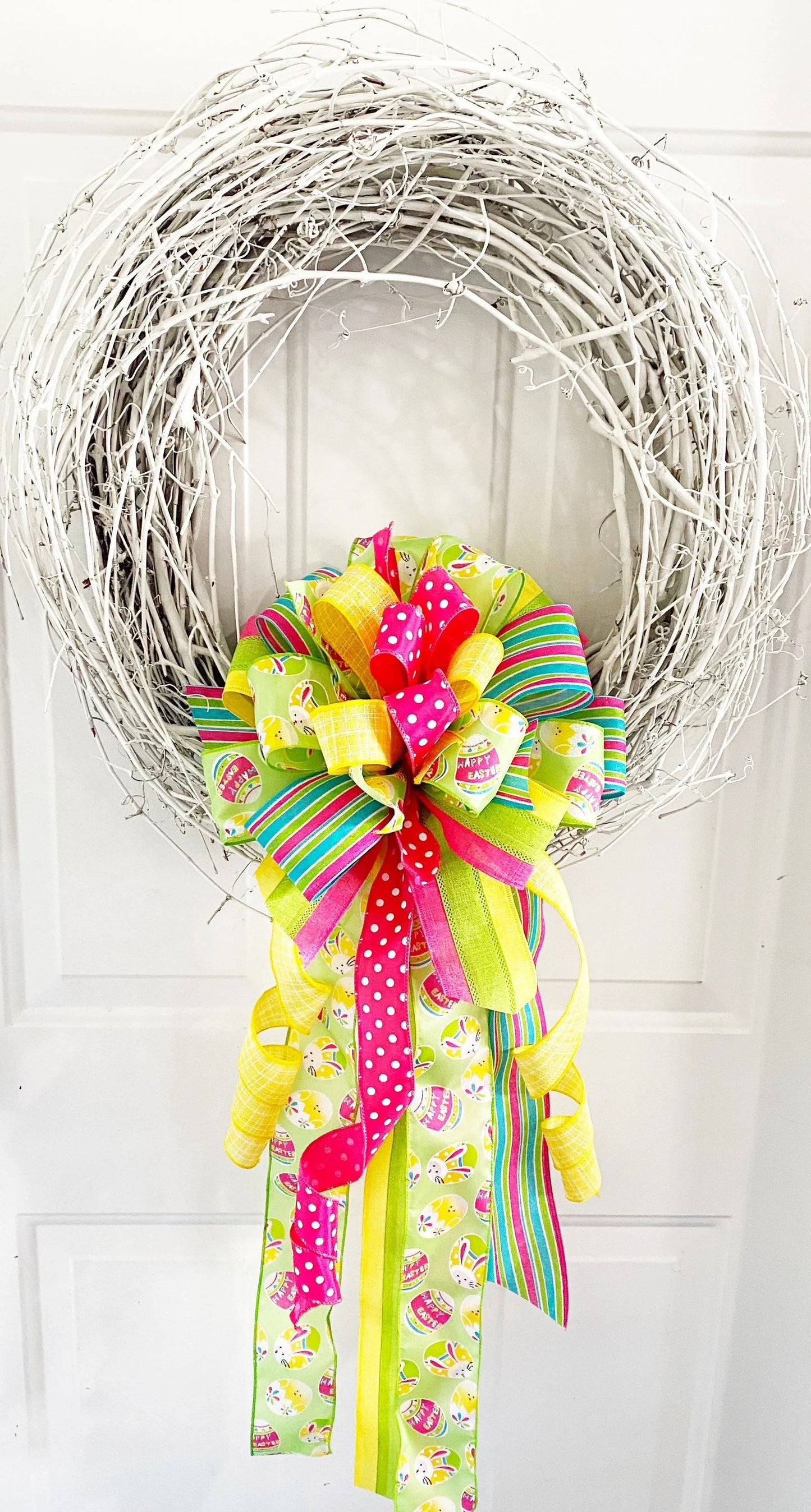 Easter Bow in Yellow, Pink, & Green with Multi Pattern Ribbon Featuring Easter Eggs and Bunnies. Perfect for Mailbox, Door, and Wreath.