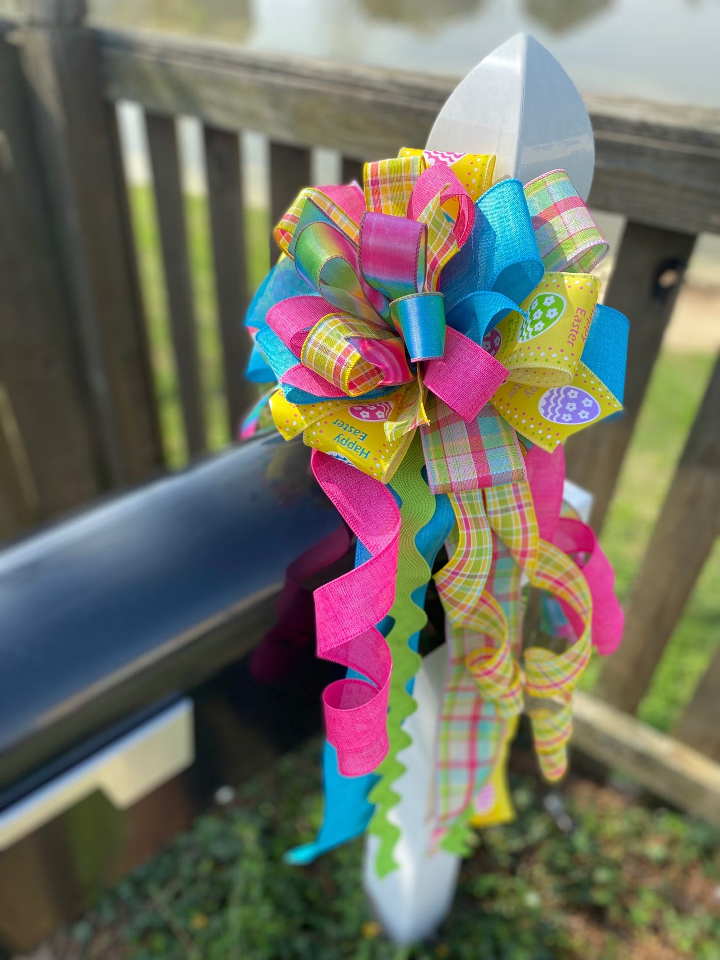 Easter Bow in Teal, Yellow, and Pink Multipattern Featuring Easter Eggs. Perfect for Mailbox, Door, and Wreath.