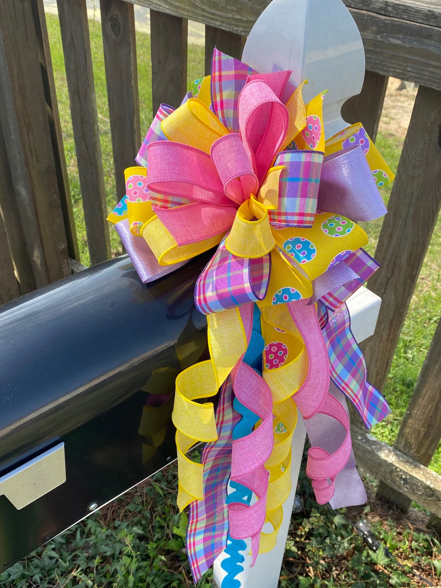 Easter Bow in Yellow, Lavender, and Pink with Multipattern Ribbon, Featuring Eggs. Perfect for Mailbox, Door, and Wreath.