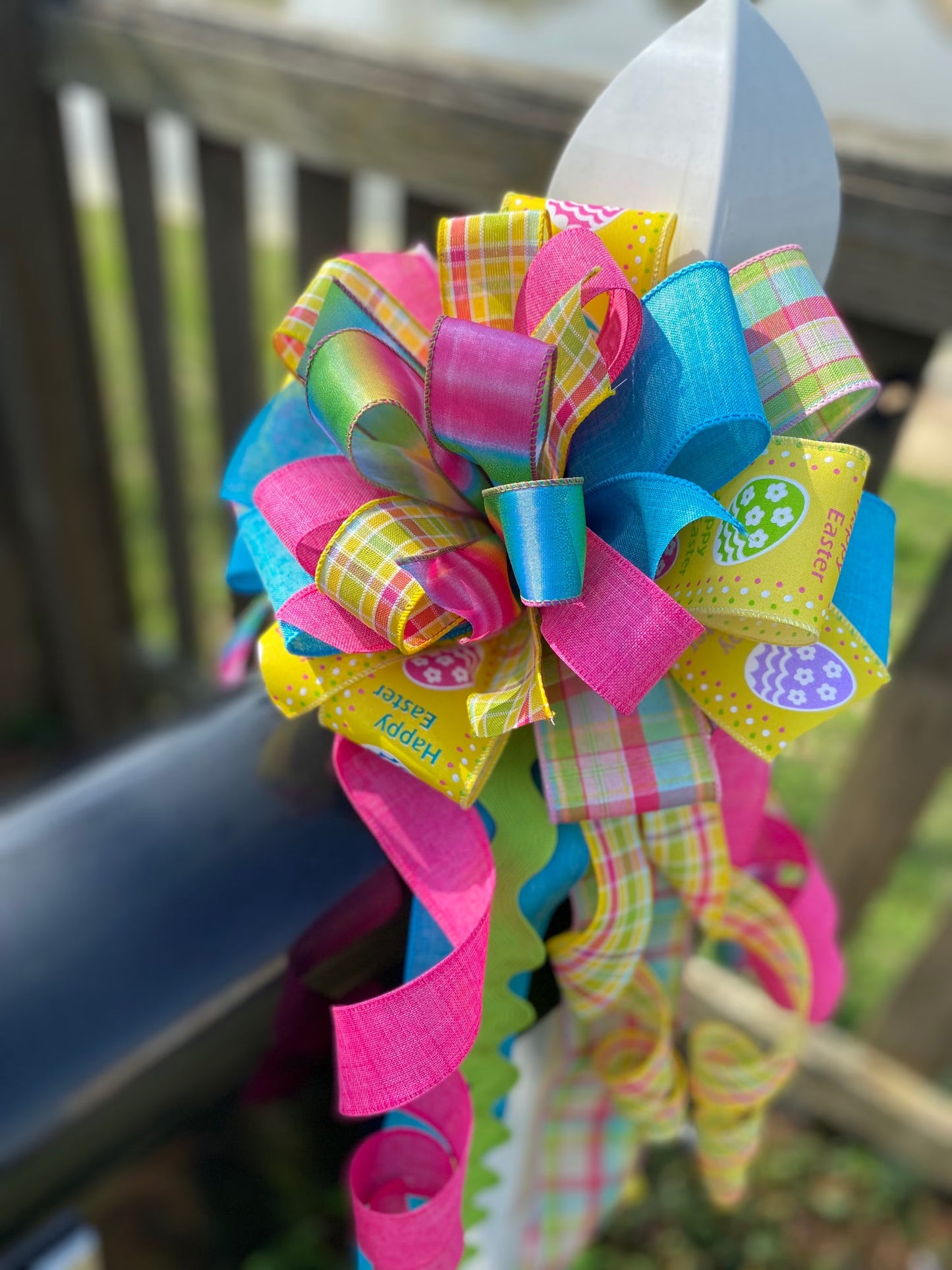 Easter Bow in Teal, Yellow, and Pink Multipattern Featuring Easter Eggs. Perfect for Mailbox, Door, and Wreath.