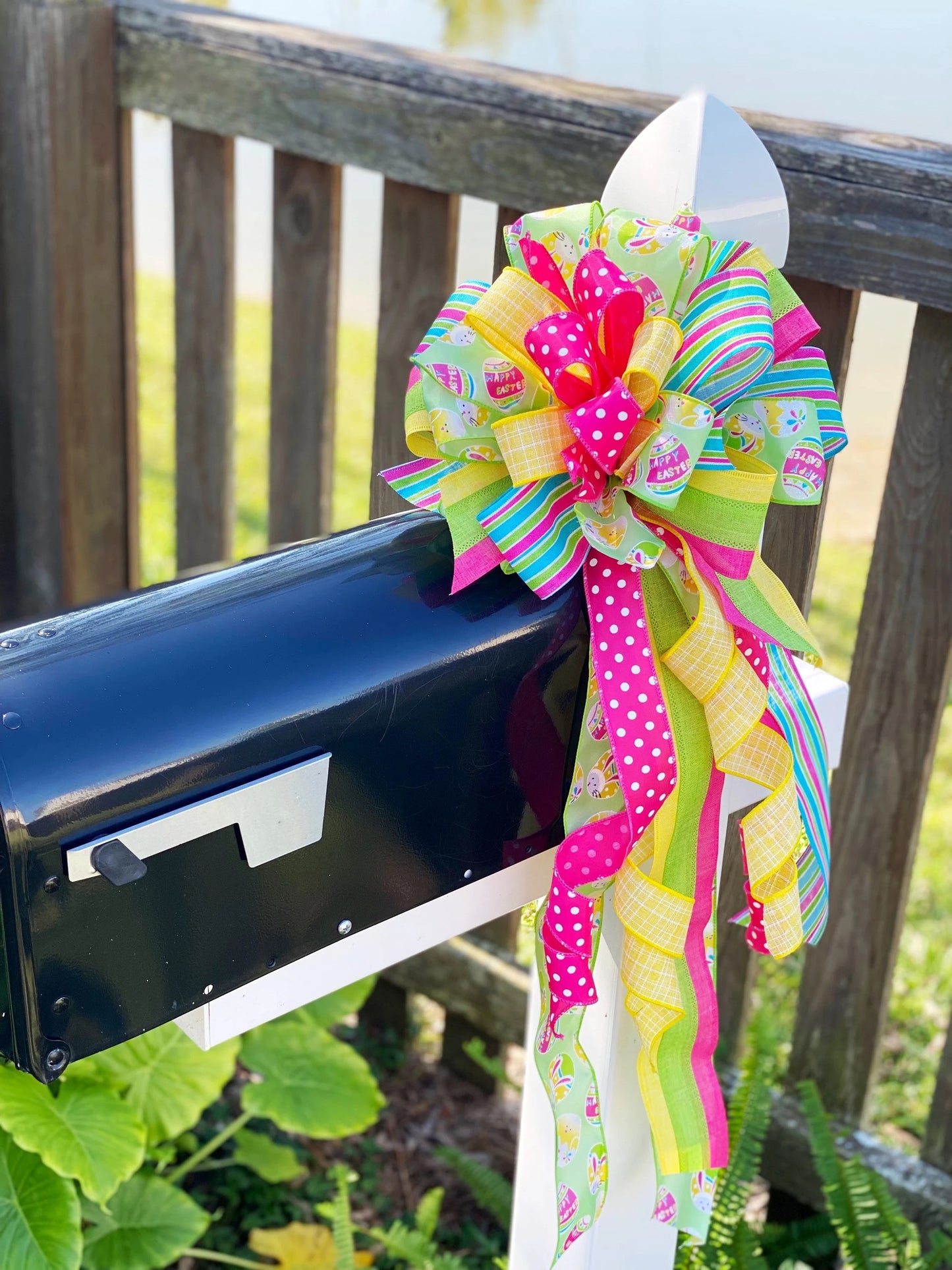 Easter Bow in Yellow, Pink, & Green with Multi Pattern Ribbon Featuring Easter Eggs and Bunnies. Perfect for Mailbox, Door, and Wreath.