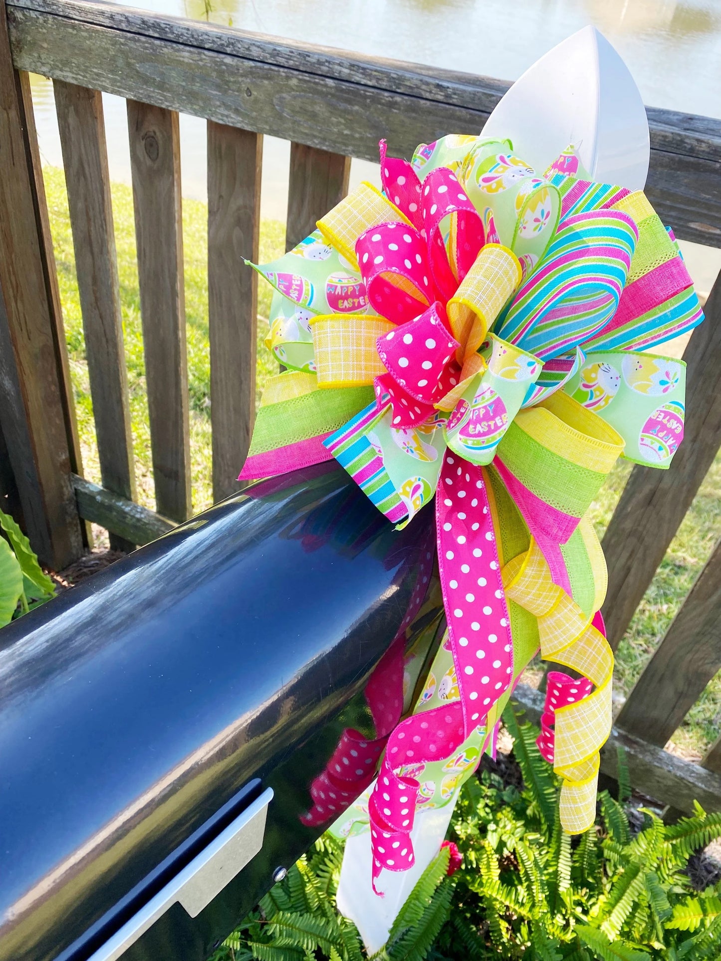 Easter Bow in Yellow, Pink, & Green with Multi Pattern Ribbon Featuring Easter Eggs and Bunnies. Perfect for Mailbox, Door, and Wreath.