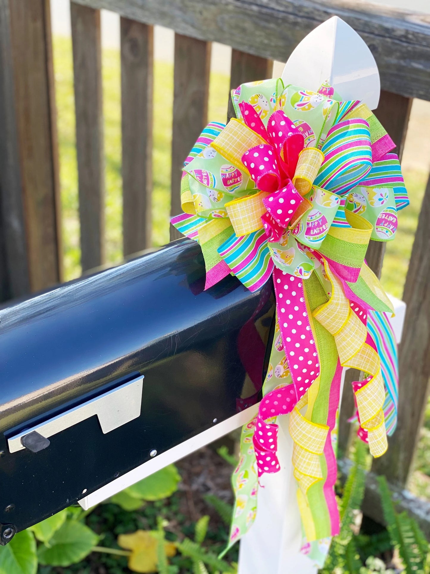 Easter Bow in Yellow, Pink, & Green with Multi Pattern Ribbon Featuring Easter Eggs and Bunnies. Perfect for Mailbox, Door, and Wreath.