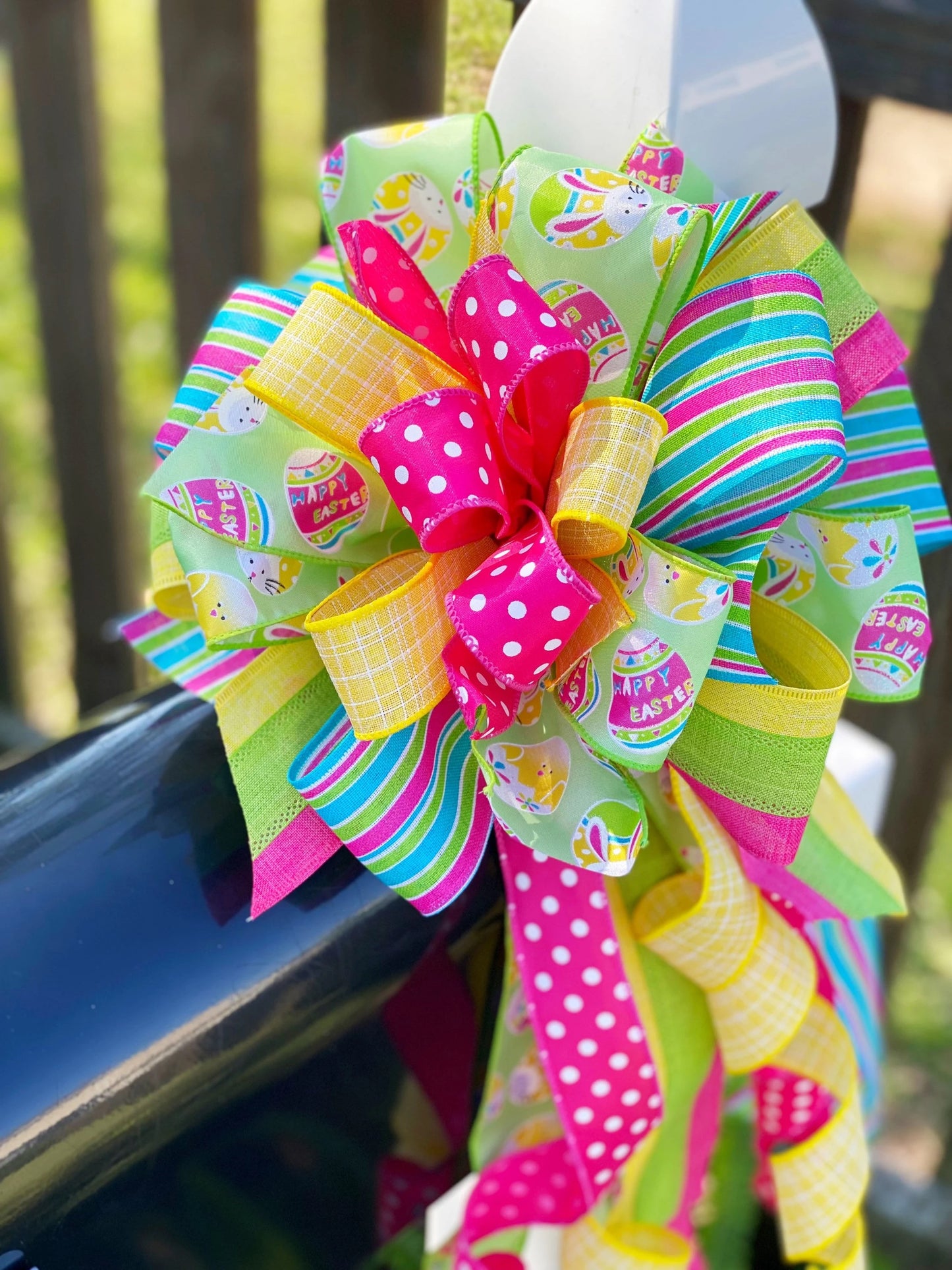 Easter Bow in Yellow, Pink, & Green with Multi Pattern Ribbon Featuring Easter Eggs and Bunnies. Perfect for Mailbox, Door, and Wreath.