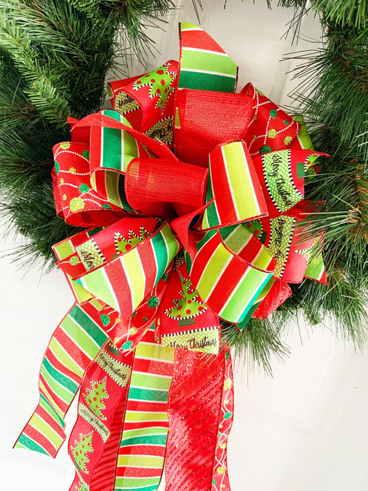 Christmas Bow in Green and Red Featuring Ribbon with Christmas Tree and "Merry Christmas" Ribbon. Perfect for Mailbox, Door, and Wreath.
