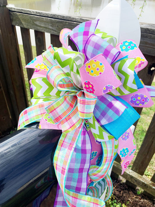 Easter Bow in Light Green and Pink with Multipattern Ribbon Featuring Eggs. Perfect for mailbox, Door, and Wreath.