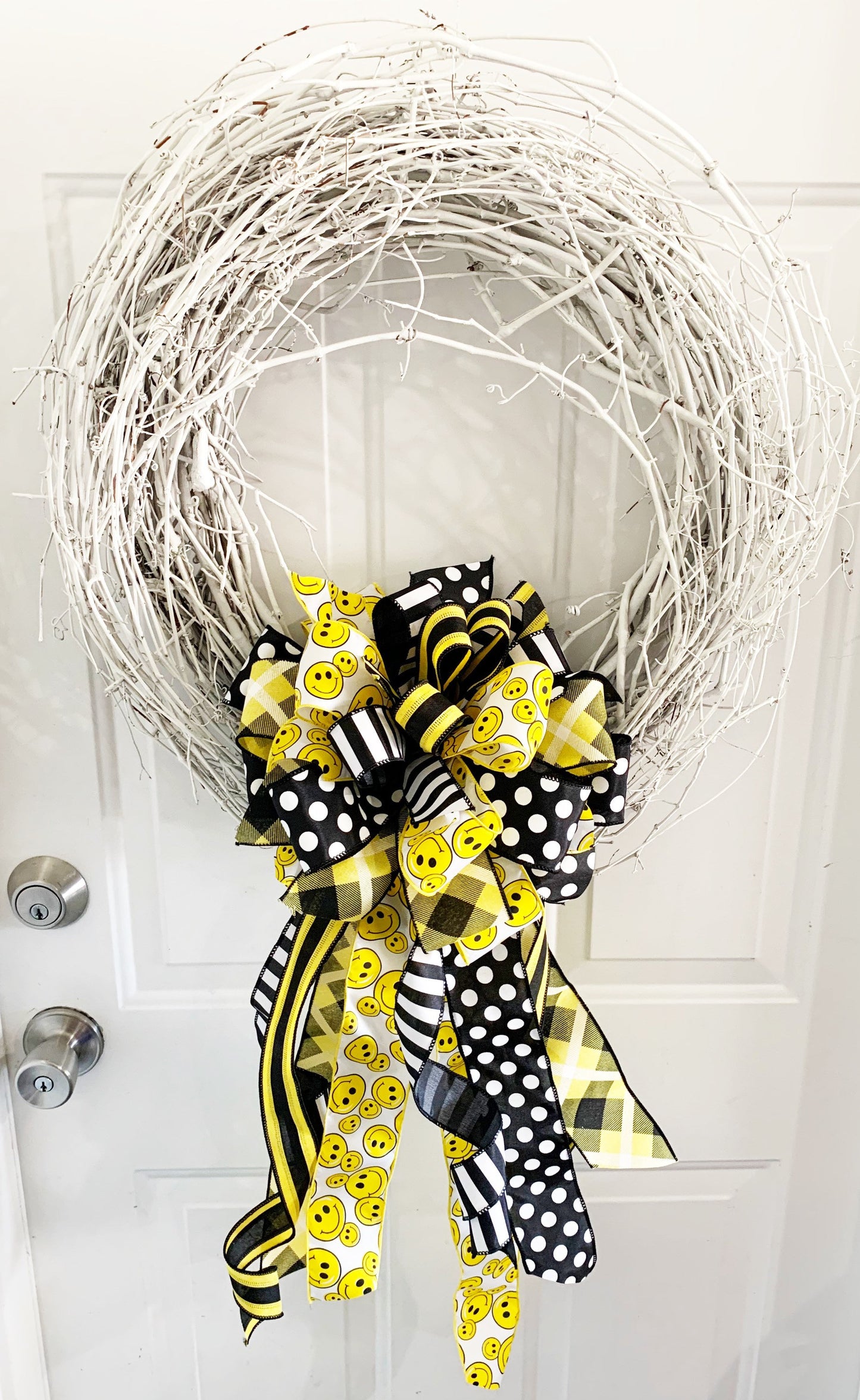 Smiley Bow in Yellow, Black, & White with Multiple Pattern Ribbon. Perfect for Mailbox, Door, and Wreath.