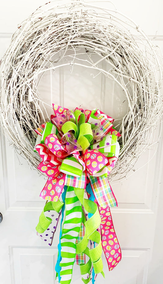 Easter Bow in Bright Pink and Green Featuring Multicolor Easter Egg Ribbon. Perfect for Mailbox, Door, and Wreath.